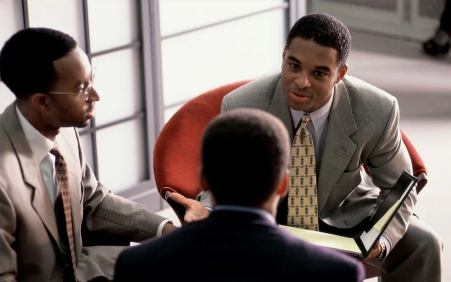 Black professionals working together in a meeting